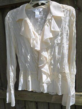 Sexy Feminine blouse that is always in style; sheer eyelet fabric w lace